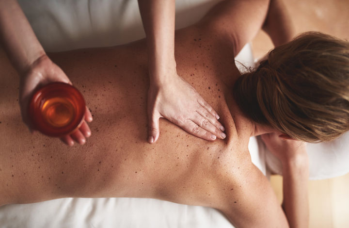 A relaxing back massage with warm oil